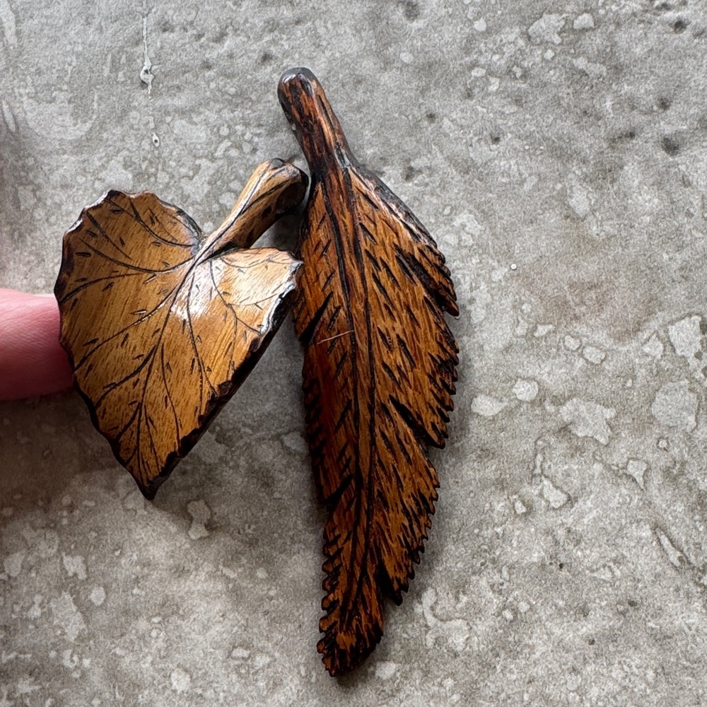 Vintage wood hand carved necklace adornments.